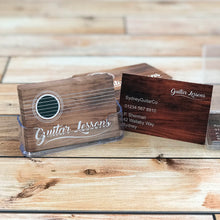 Load image into Gallery viewer, Stylish business cards for guitar lessons displayed on wooden background, showcasing 350gsm business card printing.